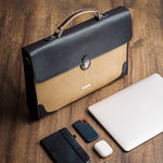 The Motivator canvas briefcase in khaki beige, packed for the working day.