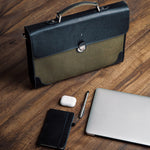 The Motivator canvas briefcase in khaki green, packed for the working day.