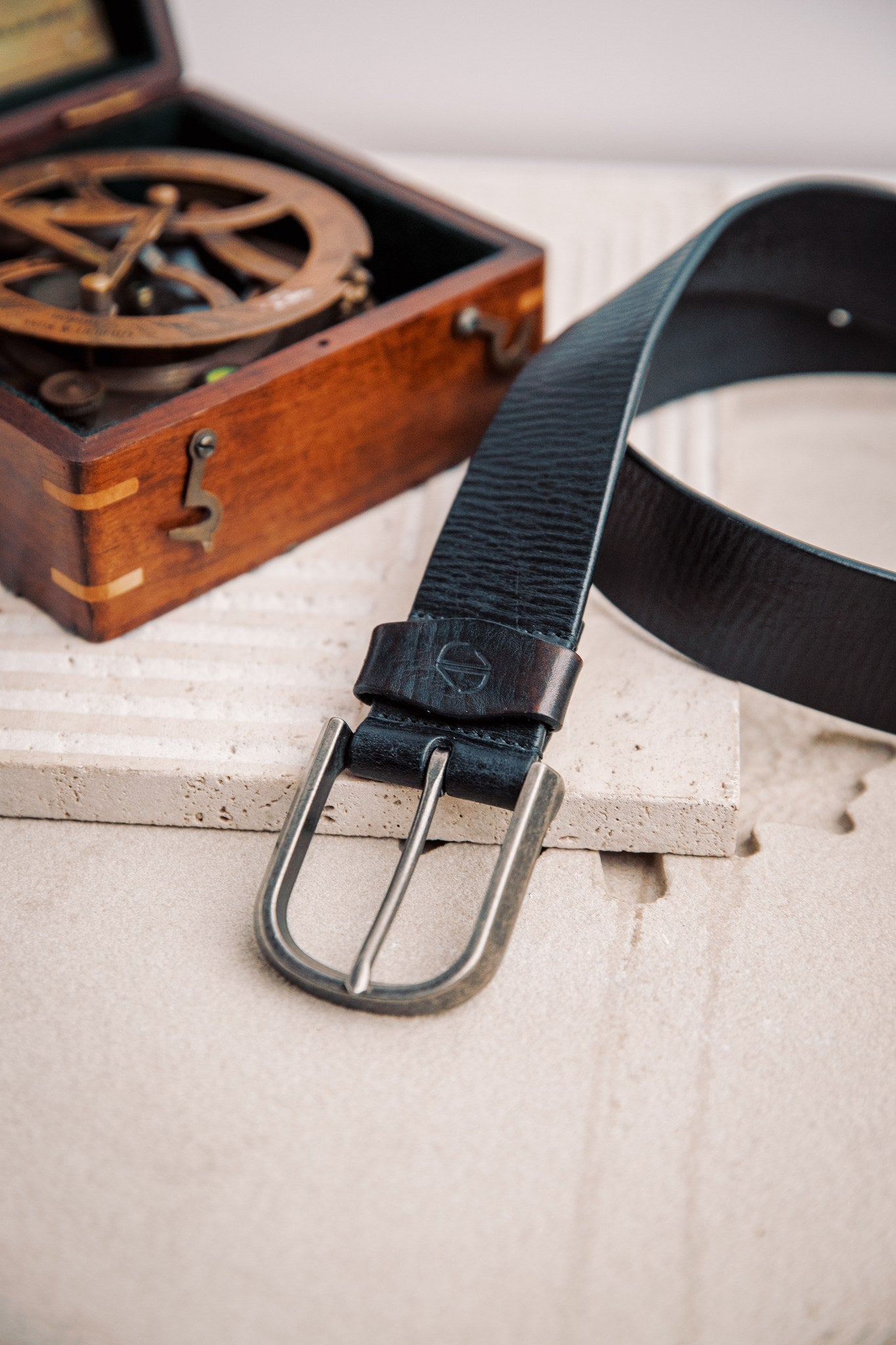 Close view of the milled leather grain of the Pedro belt in black