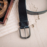 Close view of the silver finish buckle and hand-sewn buckle points on the Pedro belt in black