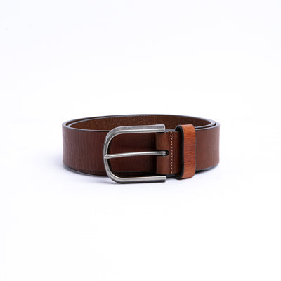 Detail of the cognac Spanish full grain milled leather of the Pedro belt