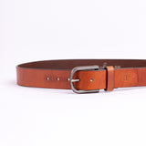 The Pedro belt in tan milled leather shown at full length, with silver finish buckle
