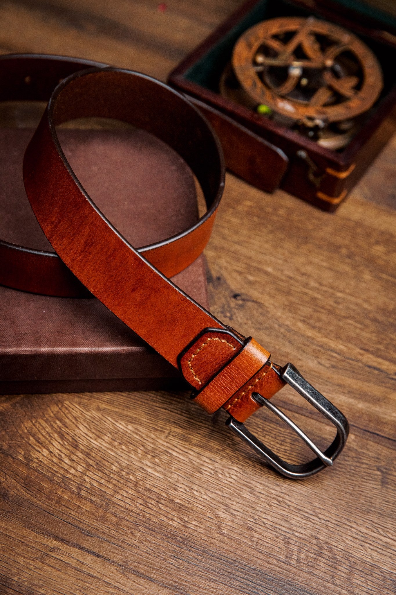 Close view of the milled leather grain of the Pedro belt in tan