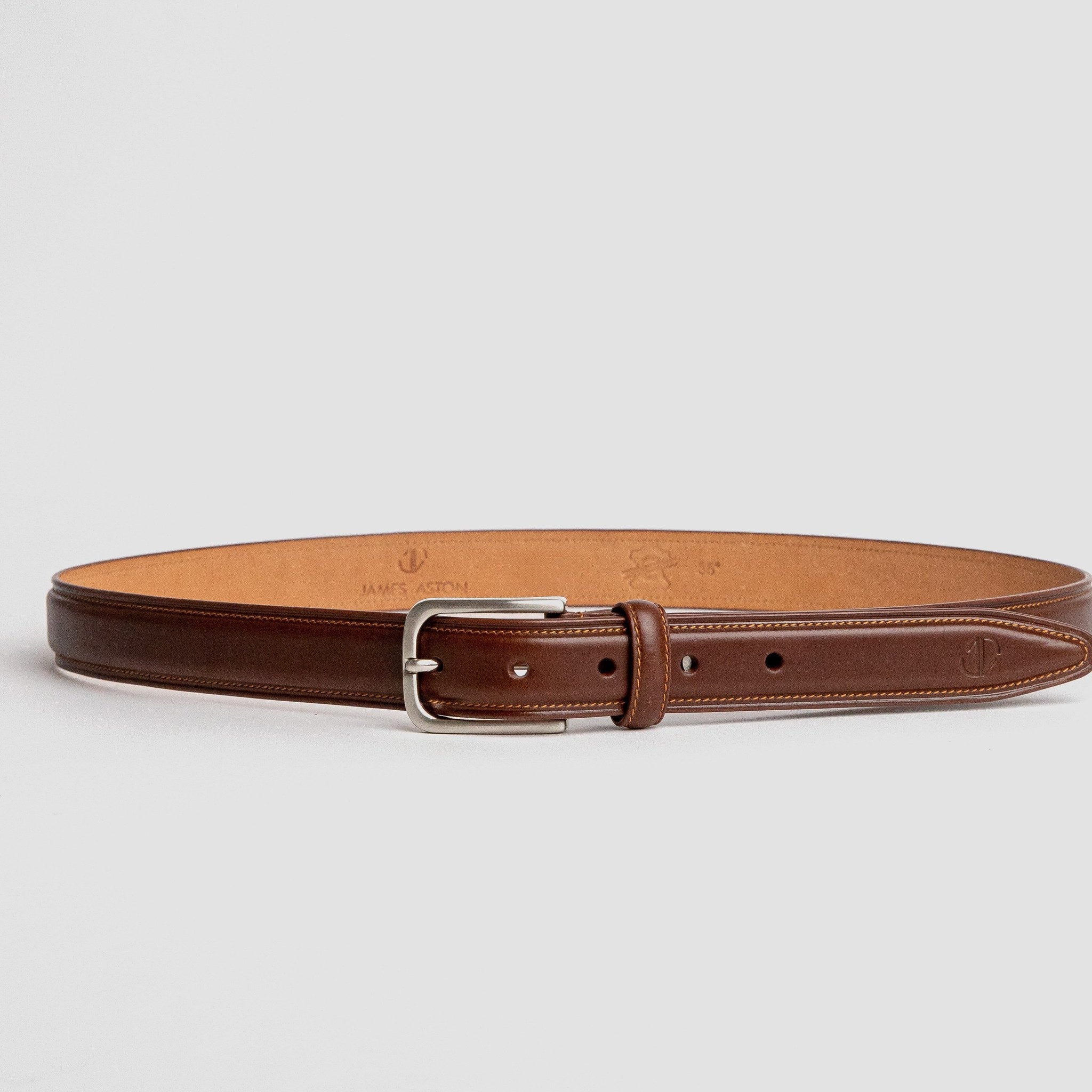 Close detail of the high raised full grain leather crown of The Ramon in cognac, by James Aston
