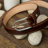 The Santo belt buckle in Cognac, hardware detail