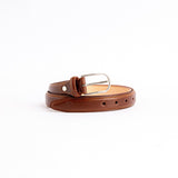 The Santo belt in Cognac Italian full grain vegetable tanned Vachetta leather, by James Aston