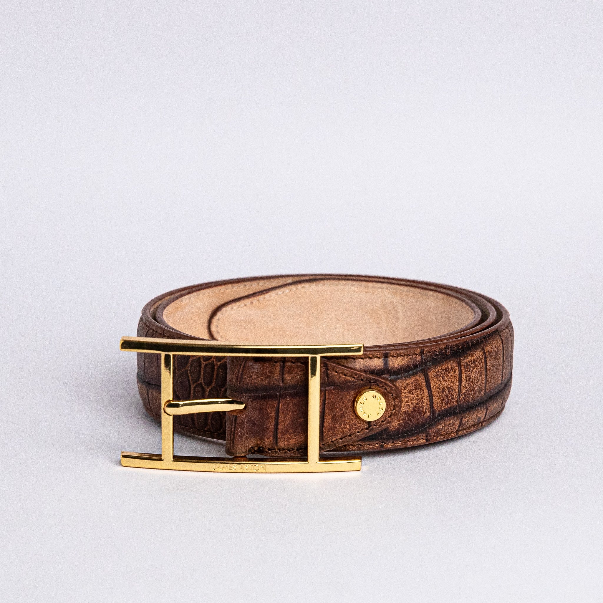 The Vincenzo belt in Cognac Italian vegetable tanned embossed leather, by James Aston