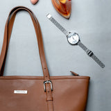 The Wanderer's Tote in cognac, carried for the day.