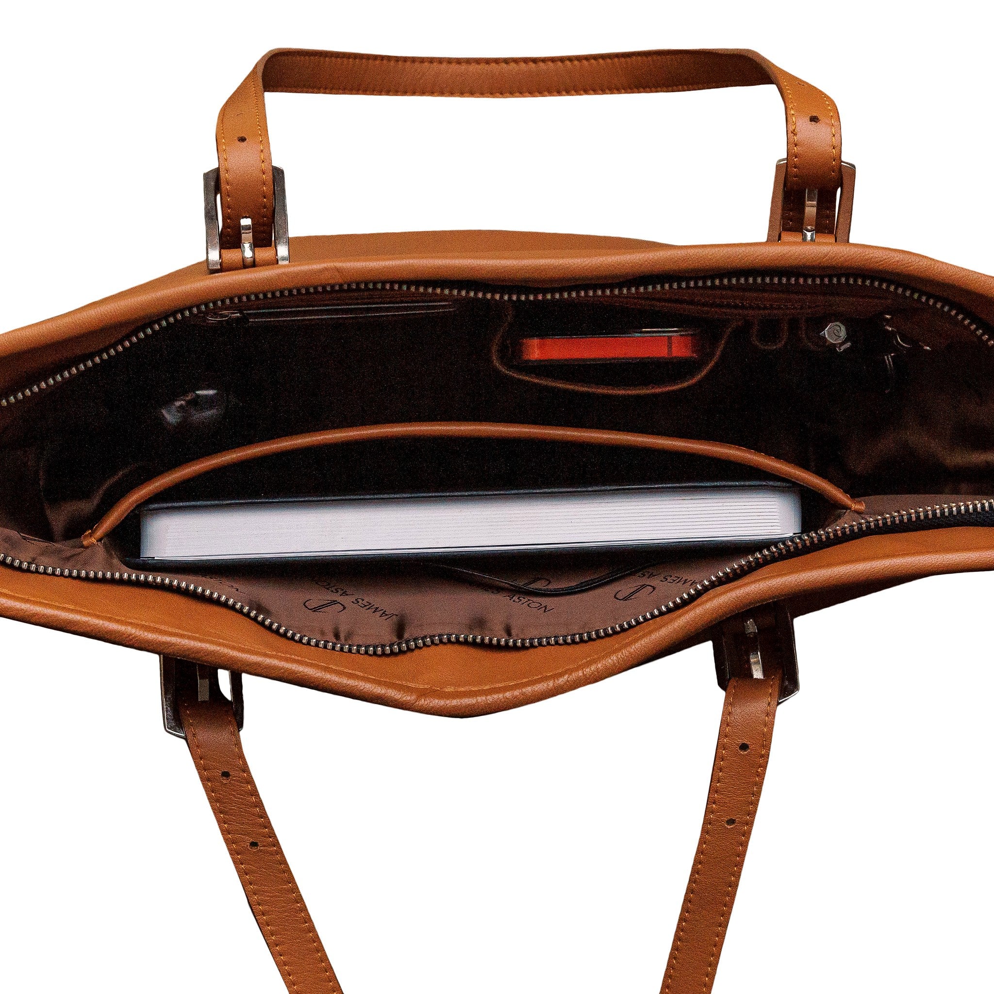 Close view of the cognac Spanish milled leather and stitching on The Wanderer's Tote.