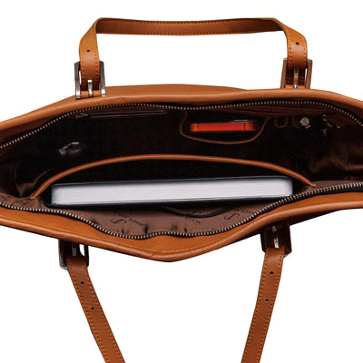 Close view of the cognac Spanish full grain leather and stitching on The Wanderer's Tote.