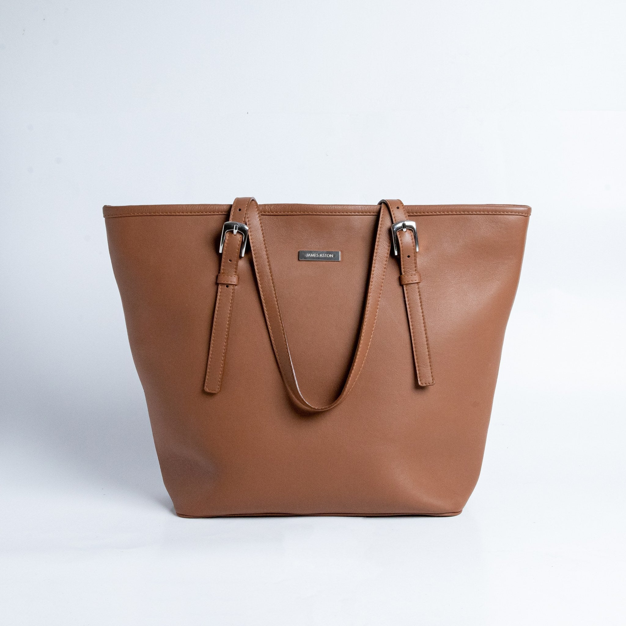 The Wanderer's Tote in cognac Spanish milled leather, front view.