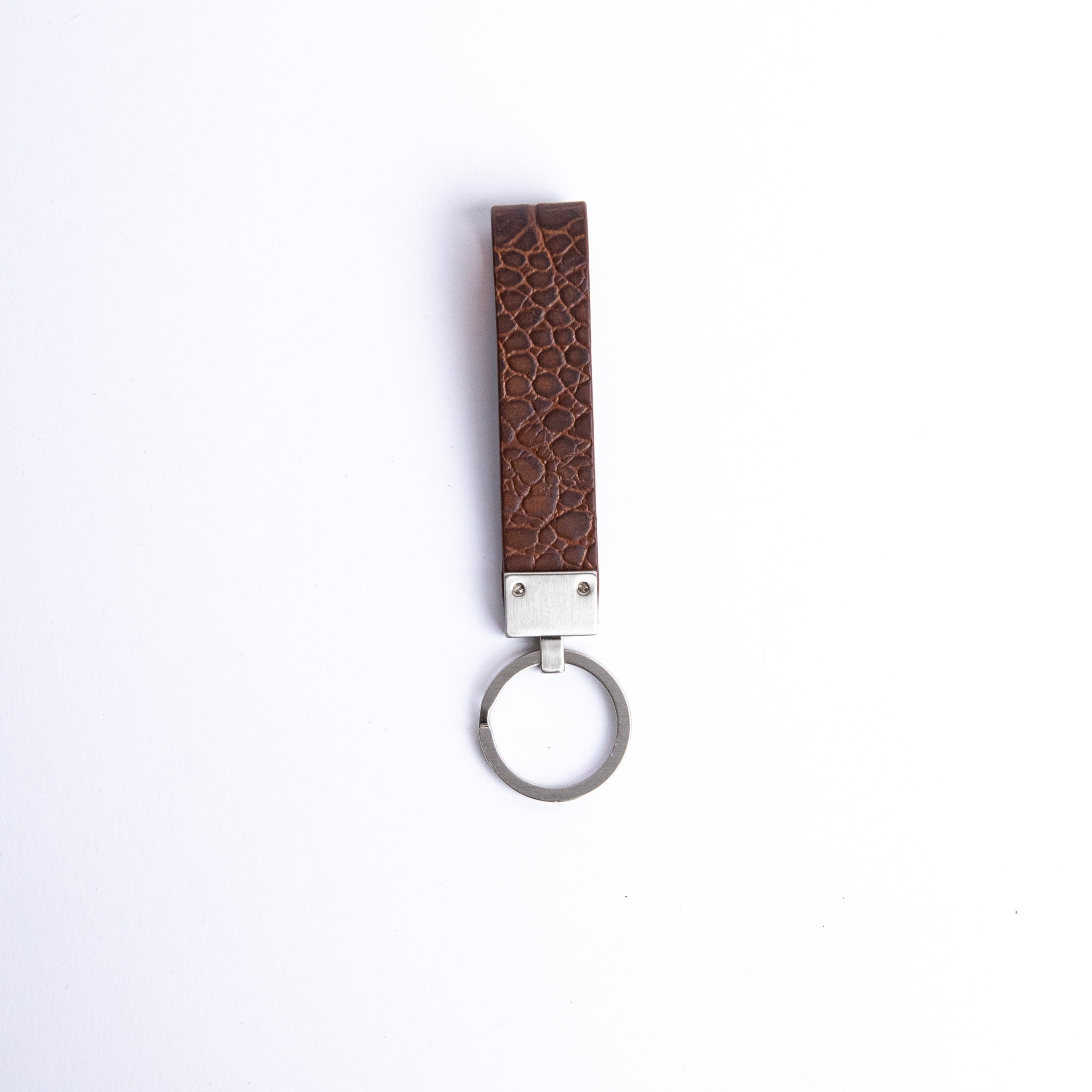 The back of the Vincenzo II key holder in cognac embossed grain leather.
