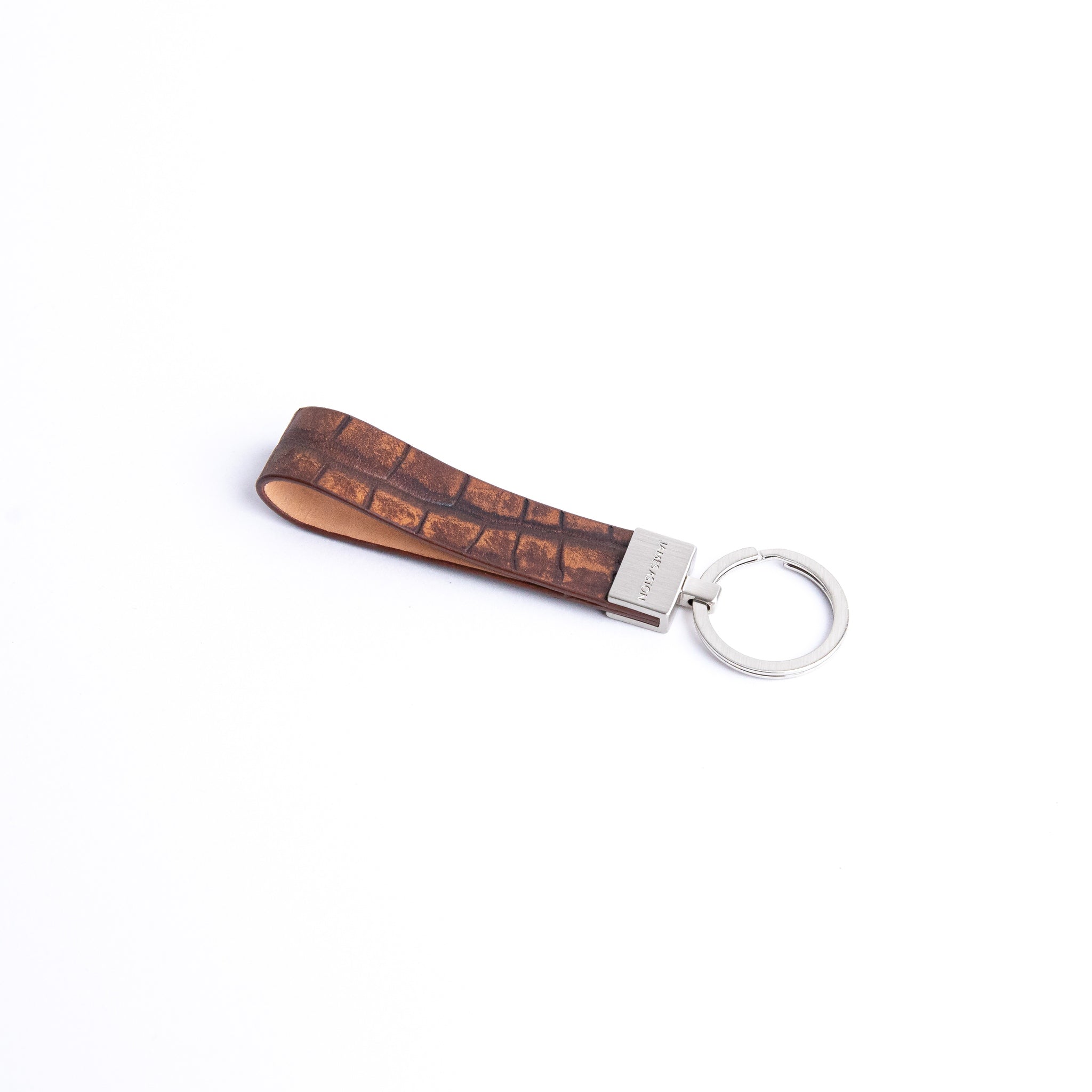 The Vincenzo II key holder in cognac Italian vegetable tanned embossed grain leather, by James Aston