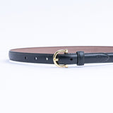 The Vittoria dress belt in black Vachetta leather, full length, with gold buckle.