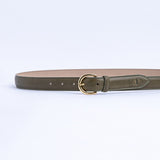 The Viviana dress belt in olive Vachetta leather, full length, with gold buckle.