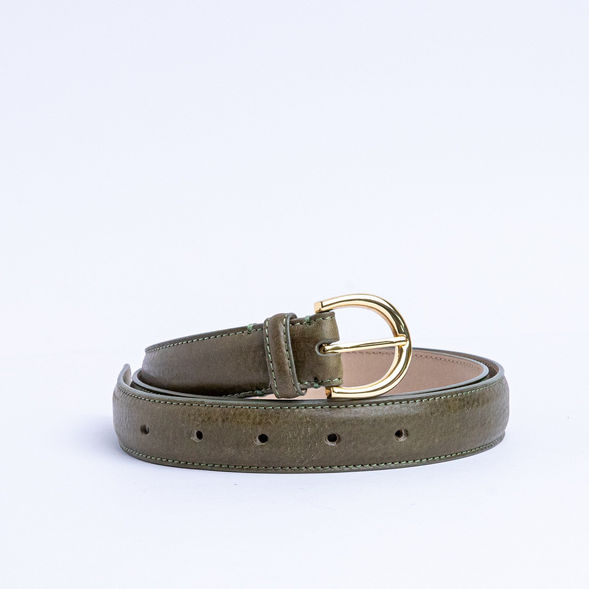 The Viviana dress belt in olive Italian Vachetta leather, coiled.