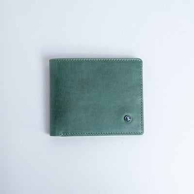 The Zanebono Bifold I wallet in sea green vegetable tanned smooth Vachetta leather, by James Aston