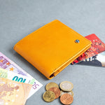 The Zanebono Bifold II wallet in tan, composed.
