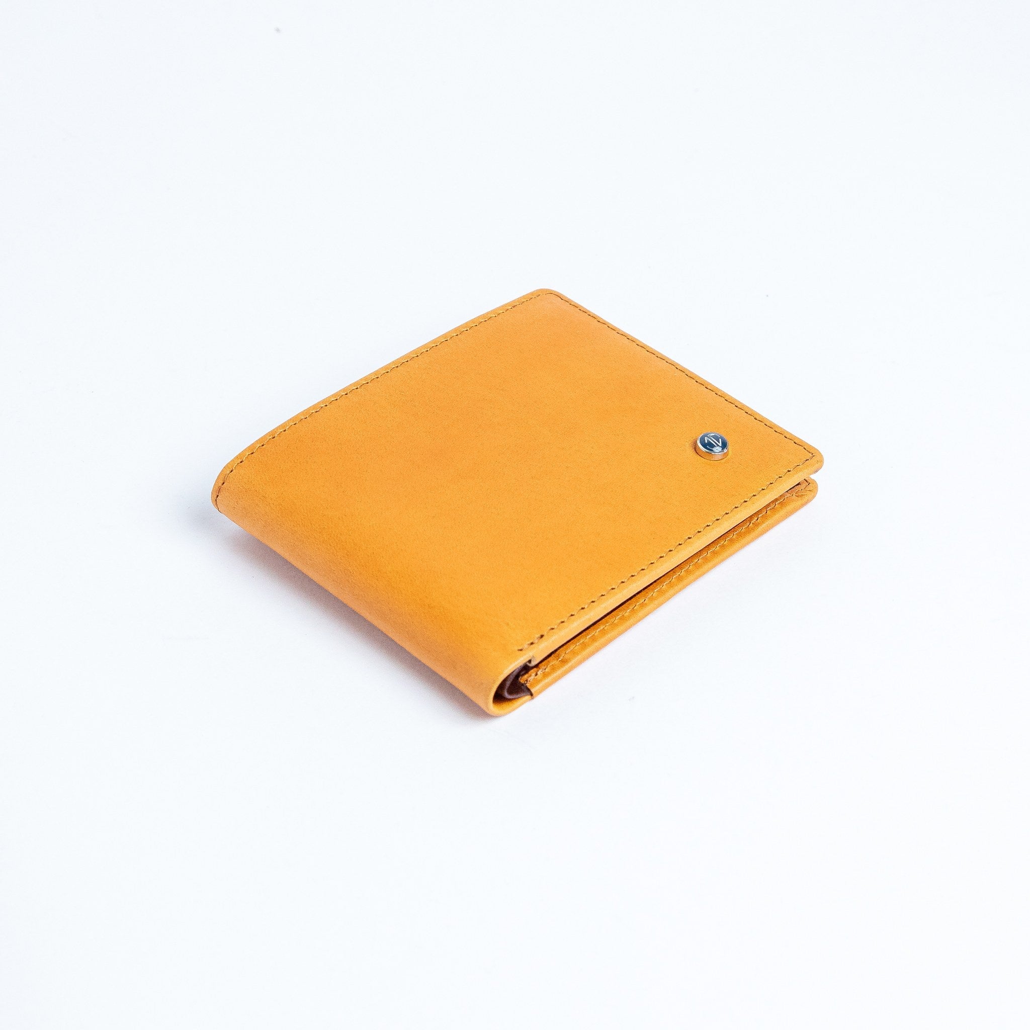 The Zanebono Bifold II wallet in tan smooth Vachetta leather.