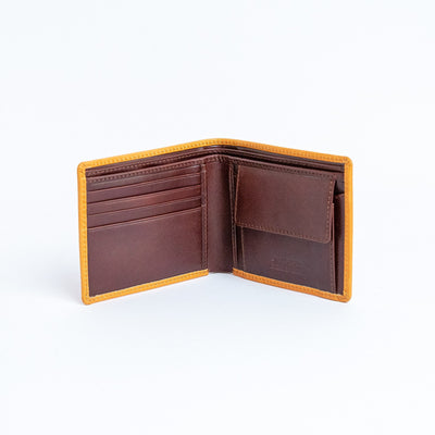 The interior of the Zanebono Bifold II in tan, four card slots and a coin pocket.