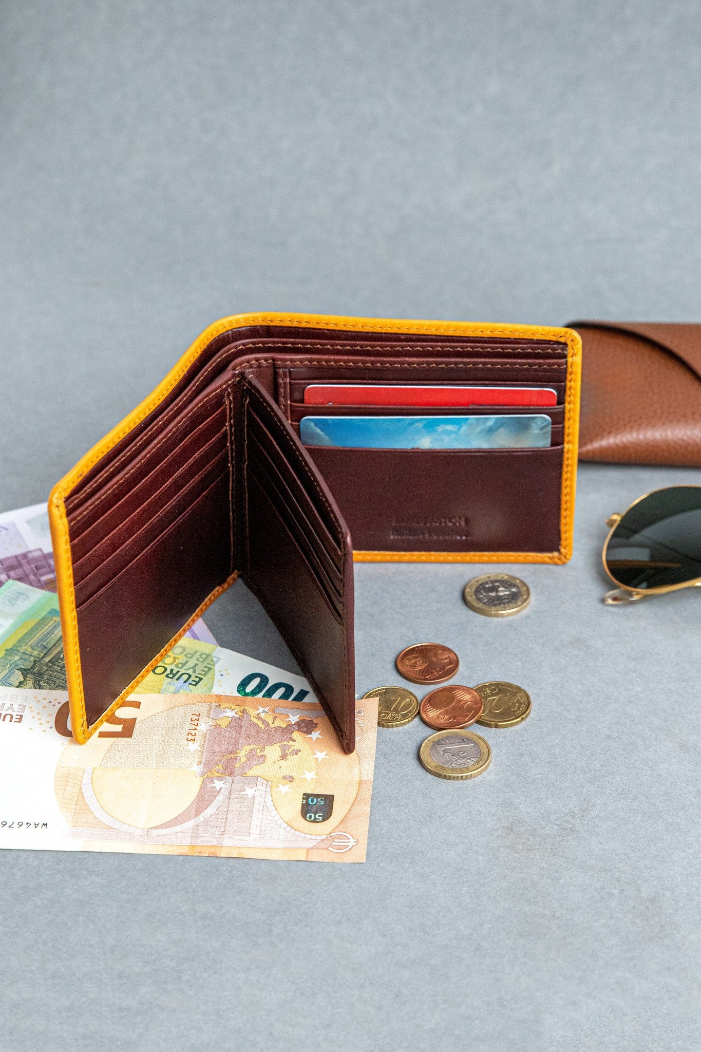 The Zanebono With Flap I in tan smooth Vachetta leather, in its setting.