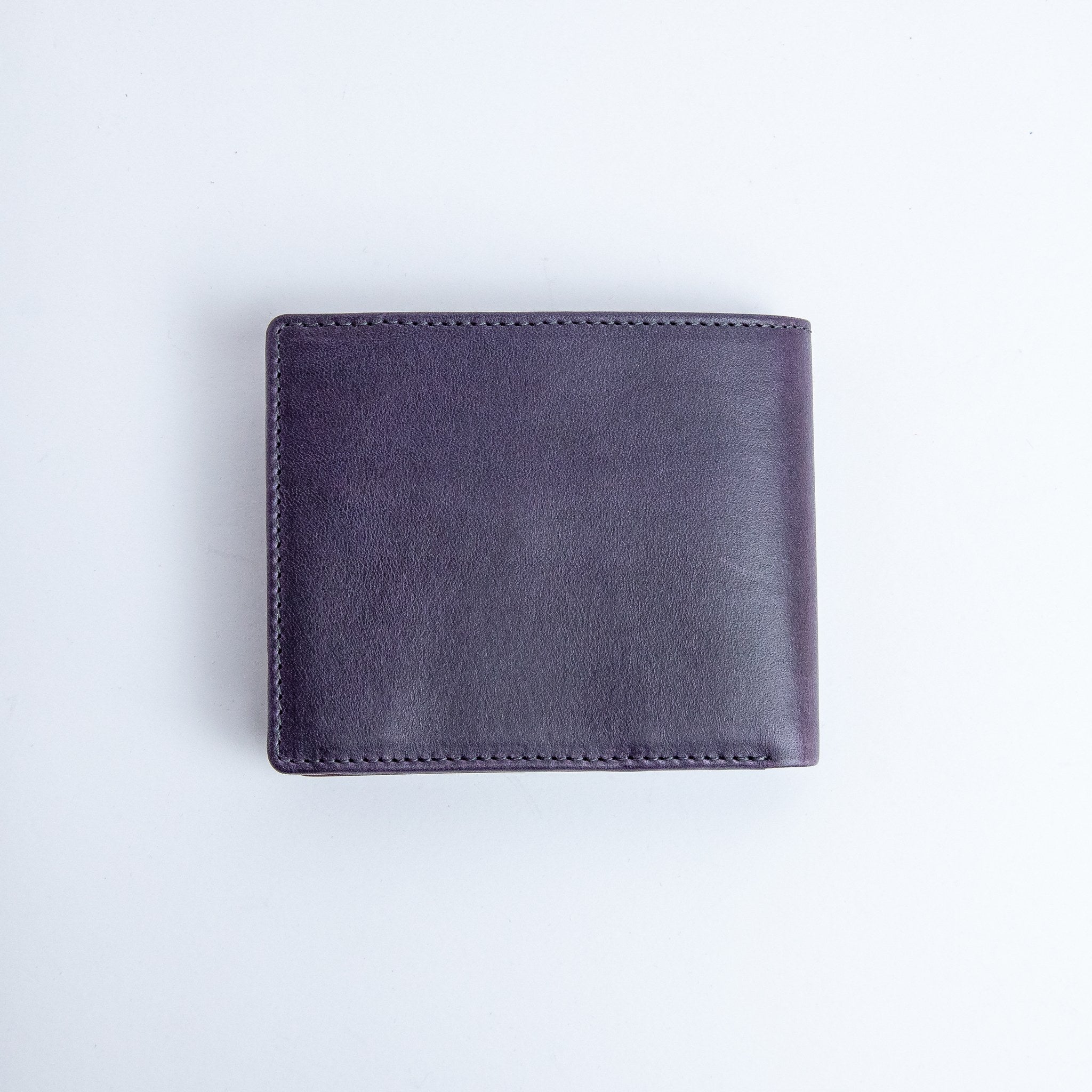 The back of the Zanebono With Flap II wallet in indigo smooth Vachetta leather.
