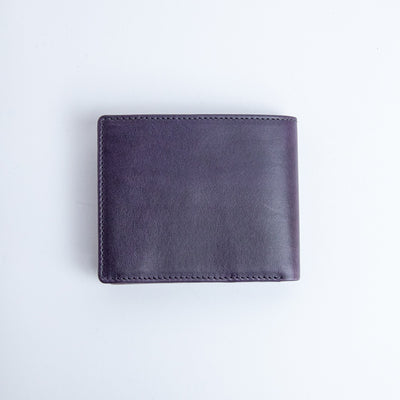The back of the Zanebono With Flap II wallet in indigo smooth Vachetta leather.