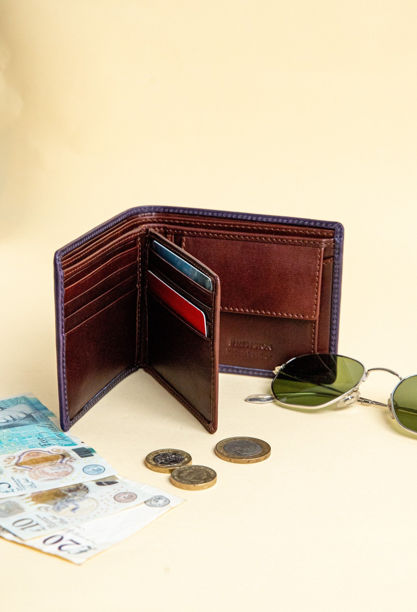The smooth Vachetta leather of the Zanebono With Flap II wallet in indigo.
