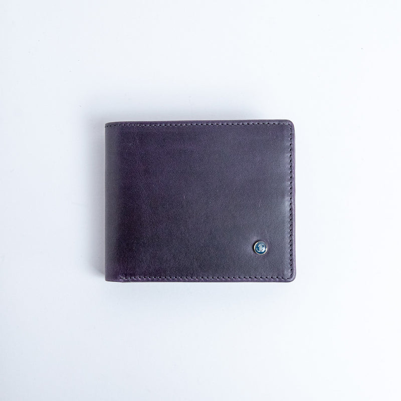 The Zanebono With Flap II wallet in indigo vegetable tanned smooth Vachetta leather, by James Aston