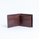 The interior of the Zanebono With Flap II in indigo, showing the card slots and coin pocket.