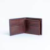 The interior of the Zanebono With Flap II in indigo, showing the card slots and coin pocket.