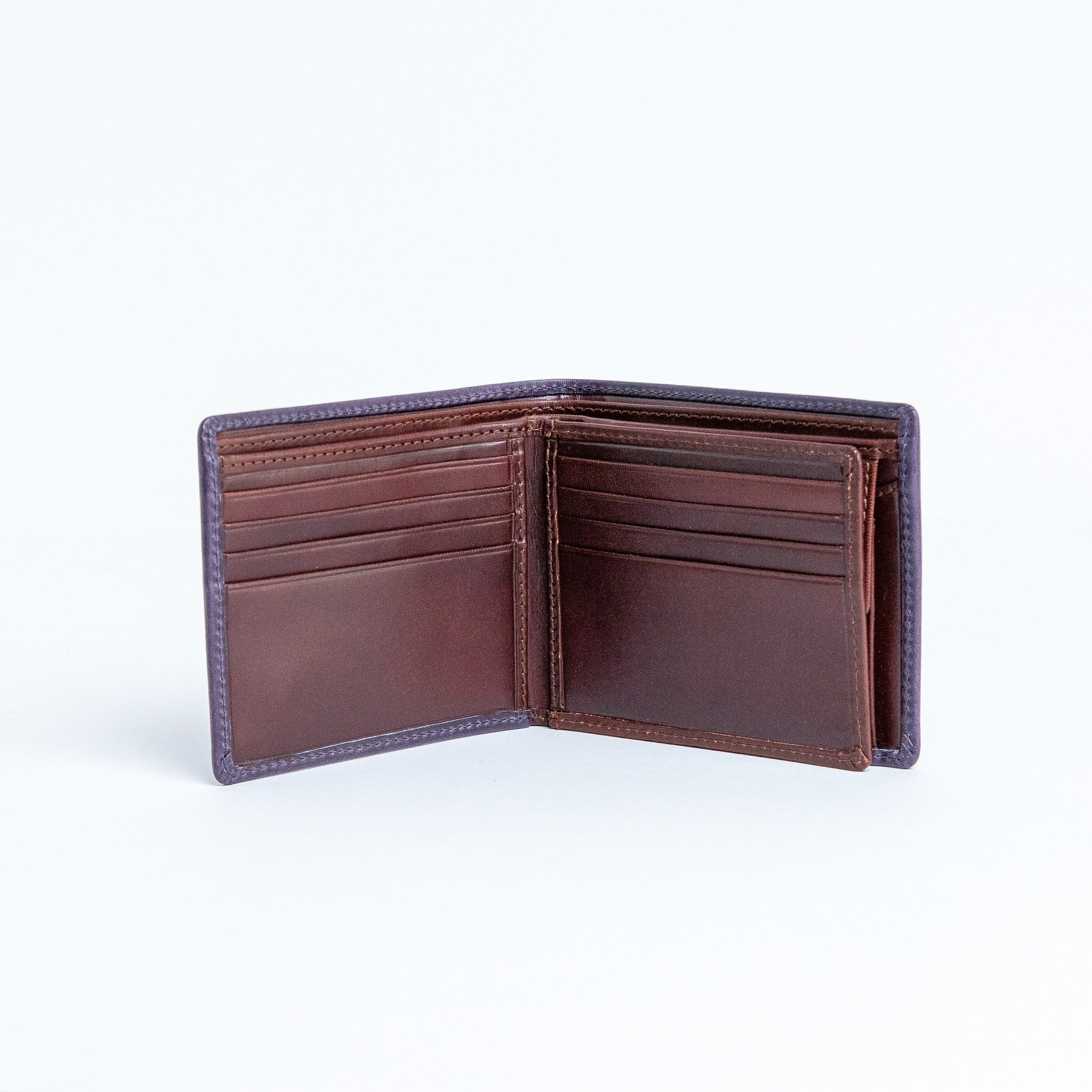 The interior of the Zanebono With Flap II in indigo, showing the card slots and coin pocket.